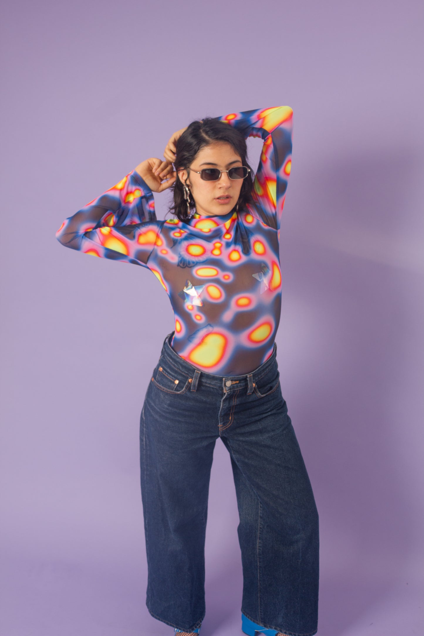 Blusa mesh manga campana lava negra