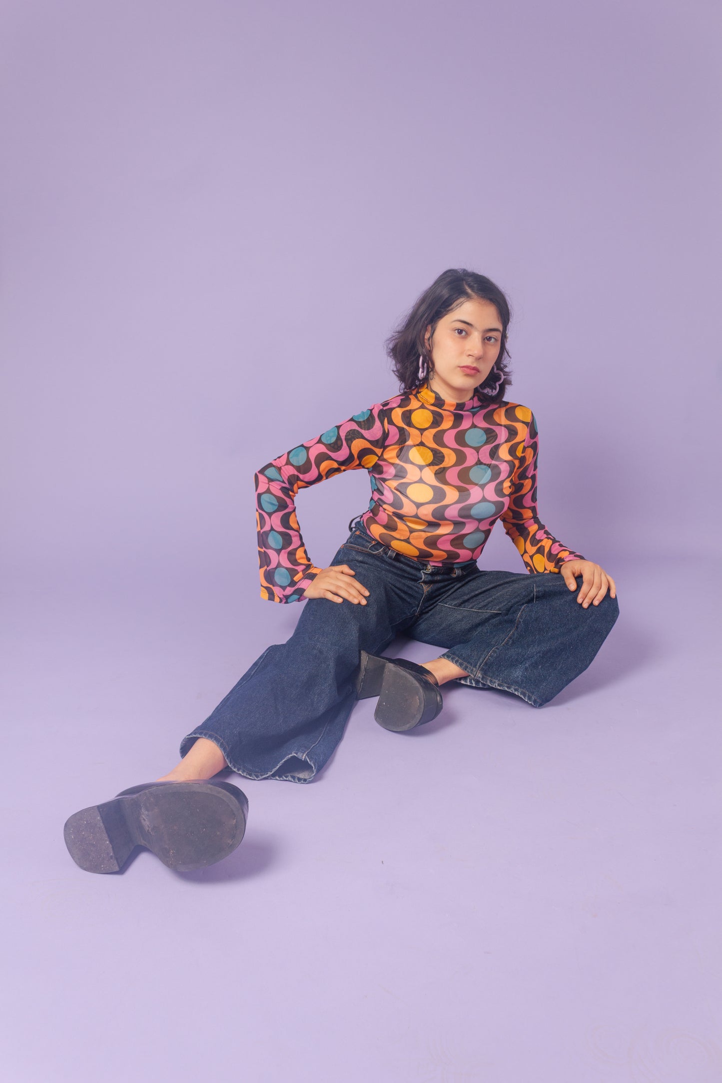 Blusa mesh manga campana geométrico